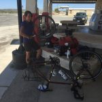 Cheyenne fixing her flat tire in Langtry, TX